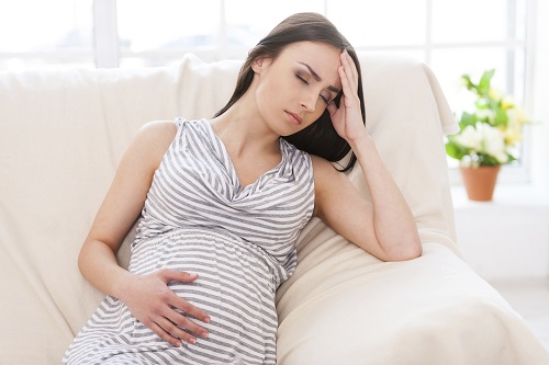 Mệt mỏi cơ thể suy nhược là biểu hiện thiếu sắt của bà bầu